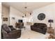 Spacious living room with high ceilings, comfortable seating, and an open floor plan at 364 Rushing Creek Ct, Henderson, NV 89014
