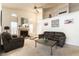 Bright living room featuring a fireplace, vaulted ceilings, and neutral colors at 364 Rushing Creek Ct, Henderson, NV 89014