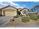 Charming single-story home with a well-manicured front yard and desert landscaping at 3841 Budenny Dr, Las Vegas, NV 89122
