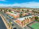 Aerial view of the community, showcasing the buildings, tennis court, and pool at 5339 Indian River Dr # 281, Las Vegas, NV 89103