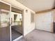A covered outdoor balcony with sliding glass door and outdoor storage at 5339 Indian River Dr # 281, Las Vegas, NV 89103