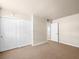 Empty carpeted bedroom with double closet at 5339 Indian River Dr # 281, Las Vegas, NV 89103