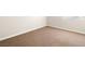 Empty carpeted bedroom with window and neutral walls at 5339 Indian River Dr # 281, Las Vegas, NV 89103