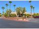The Bella Vita clubhouse building nestled among palm trees at 5339 Indian River Dr # 281, Las Vegas, NV 89103
