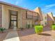 Exterior condo view featuring balconies, stone accents, and easy access to stairs at 5339 Indian River Dr # 281, Las Vegas, NV 89103