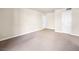 Spacious living room featuring neutral walls and carpet flooring for comfort at 5339 Indian River Dr # 281, Las Vegas, NV 89103