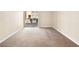Bright living room featuring plush carpet and sliding doors to a private balcony at 5339 Indian River Dr # 281, Las Vegas, NV 89103