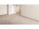 Spacious, carpeted living room with neutral walls at 5339 Indian River Dr # 281, Las Vegas, NV 89103