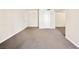 Spacious living room featuring neutral walls and carpet flooring for comfort at 5339 Indian River Dr # 281, Las Vegas, NV 89103