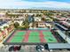 Aerial view featuring well-maintained tennis courts with scenic mountain views at 5339 Indian River Dr # 281, Las Vegas, NV 89103