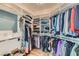 Walk-in closet with custom shelves, hanging rods, drawers, and shoe storage at 537 Tuscany View St, Las Vegas, NV 89145
