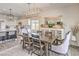 Open-concept dining and kitchen area with stylish furnishings at 5755 E La Campana Dr, Pahrump, NV 89061