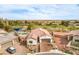 Charming home with a tile roof, paver driveway, set within lush landscaping and golf course views at 5755 E La Campana Dr, Pahrump, NV 89061