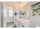 Bright bathroom featuring a large vanity with modern fixtures at 5755 E La Campana Dr, Pahrump, NV 89061