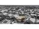Bird's-eye view of a cozy, single-story home surrounded by monochrome houses and greenery in a tranquil residential area at 6032 Port Of Dreams Dr, Las Vegas, NV 89130