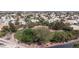 Aerial view of green community park surrounded by residential homes at 6032 Port Of Dreams Dr, Las Vegas, NV 89130