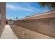 This home features a long backyard with block wall fencing for privacy at 6032 Port Of Dreams Dr, Las Vegas, NV 89130