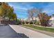 Enjoy outdoor living in this backyard with its lush lawn, mature landscaping, and patio, perfect for relaxing and entertaining at 6032 Port Of Dreams Dr, Las Vegas, NV 89130