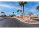 Paradise Falls community entrance with palm trees at 6032 Port Of Dreams Dr, Las Vegas, NV 89130