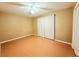 This bedroom features a ceiling fan and white curtains for blocking out the light at 6248 Dayton Ave, Las Vegas, NV 89107