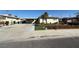 Single story home with desert landscaping and attached carport at 6248 Dayton Ave, Las Vegas, NV 89107