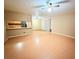 Bright living room with wood floors and open kitchen concept at 6248 Dayton Ave, Las Vegas, NV 89107