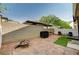 Backyard with block wall, gravel, and patio space at 6404 Extreme Shear Ave # 103, Henderson, NV 89011