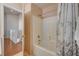 Bathroom with shower over bath and a view of the upstairs landing at 6404 Extreme Shear Ave # 103, Henderson, NV 89011