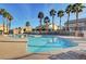 Large community swimming pool with ample deck space, ideal for relaxing and socializing on sunny days at 6404 Extreme Shear Ave # 103, Henderson, NV 89011