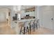 Kitchen with bar seating and modern finishes at 6404 Extreme Shear Ave # 103, Henderson, NV 89011