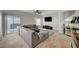 Bright living room with tile floors and access to the backyard at 6404 Extreme Shear Ave # 103, Henderson, NV 89011