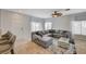 Open-concept living area with a comfortable sectional sofa at 6404 Extreme Shear Ave # 103, Henderson, NV 89011