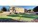 Backyard putting green, ideal for golf enthusiasts looking to practice their short game in a private setting at 6404 Extreme Shear Ave # 103, Henderson, NV 89011