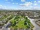 Wide aerial shot displaying a park and gazebo nestled amongst a mature and developed residential neighborhood at 6895 Kelp Ledge Ct, Las Vegas, NV 89131