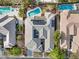 Aerial view featuring solar panels, pools, landscaping and more in a suburban neighborhood at 6895 Kelp Ledge Ct, Las Vegas, NV 89131