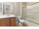Bright bathroom with a single sink vanity and a shower and tub combination at 6895 Kelp Ledge Ct, Las Vegas, NV 89131