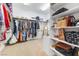 Walk-in closet with organized shelving and hanging space for clothes and accessories at 6895 Kelp Ledge Ct, Las Vegas, NV 89131