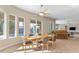 Inviting dining space with large windows, patio access, and plenty of natural light at 6895 Kelp Ledge Ct, Las Vegas, NV 89131
