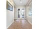 Welcoming entryway with tiled floors and decorative glass double doors at 6895 Kelp Ledge Ct, Las Vegas, NV 89131