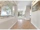 Inviting foyer with tile flooring, decorative glass and natural light at 6895 Kelp Ledge Ct, Las Vegas, NV 89131