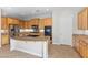 Bright kitchen featuring granite countertops, stainless steel appliances, and a kitchen island at 6895 Kelp Ledge Ct, Las Vegas, NV 89131