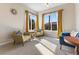 Inviting living room with natural light, comfortable seating, and stylish decor at 6895 Kelp Ledge Ct, Las Vegas, NV 89131