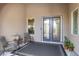 Covered outdoor patio with seating area, perfect for relaxing or entertaining at 6895 Kelp Ledge Ct, Las Vegas, NV 89131