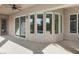 Covered patio with large sliding glass doors providing backyard views and ample natural light at 6895 Kelp Ledge Ct, Las Vegas, NV 89131