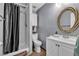 The bathroom features a shower and tub combo, toilet, and single sink vanity at 7030 Burcot Ave # D106, Las Vegas, NV 89156