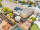Aerial view of a well-maintained property with solar panels and beautiful desert landscaping at 7033 Red Tide Dr, Las Vegas, NV 89131