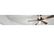 The ceiling fan has dark blades and an encased light at 7033 Red Tide Dr, Las Vegas, NV 89131