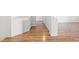 Wood floor hallway with white walls at 7033 Red Tide Dr, Las Vegas, NV 89131