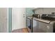 Laundry room featuring modern stainless steel washer and dryer units at 7033 Red Tide Dr, Las Vegas, NV 89131