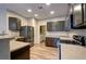 Well-equipped kitchen with stainless steel appliances and spacious layout at 7322 Fools Gold St # 102, Las Vegas, NV 89149